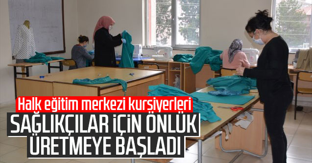 Halk eğitim merkezi kursiyerleri sağlıkçılar için önlük üretiyor