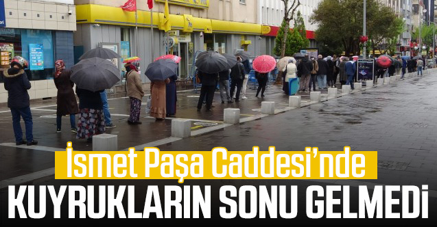 Uşak'ta yağmura rağmen kuyruklar bitmedi