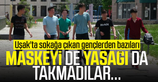 Uşak'ta sokağa çıkan gençlerden bazıları yasağa rağmen maske takmadı